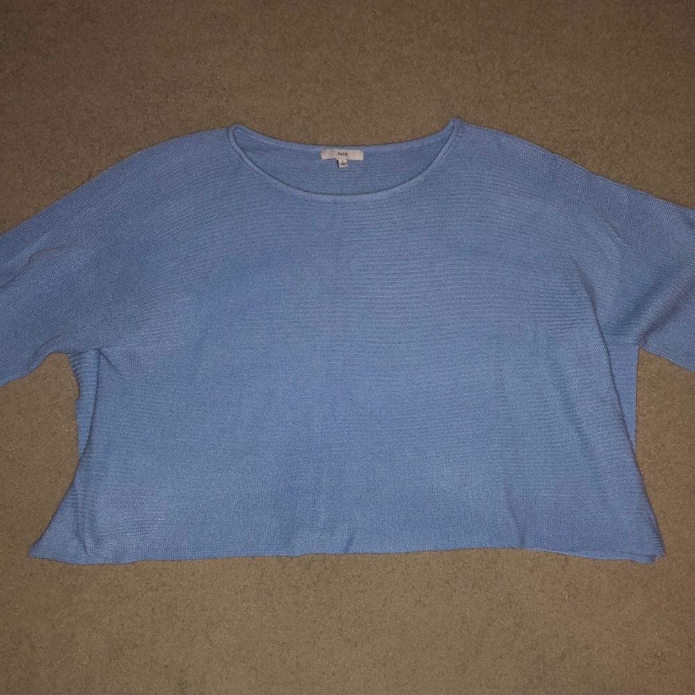 blue knit blouse side slits
